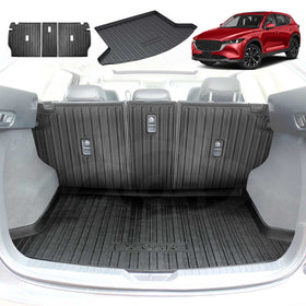 A black 3D moulded cargo mat and back seats kick mats designed for the Mazda CX-5, displayed in the cargo area of a white CX-5.