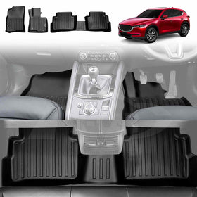 A set of black 3D moulded all-weather floor mats for a car, displayed in a vehicle interior, with a red Mazda CX5 shown in the background.