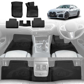 X-CAR BMW 4 Series (G26) floor mat set featuring four black carpet mats and a center rear mat, displayed with a silver BMW 4 Series Gran Coupe. The image also shows the X-CAR floor mats installed in the front and rear footwells of the vehicle interior.