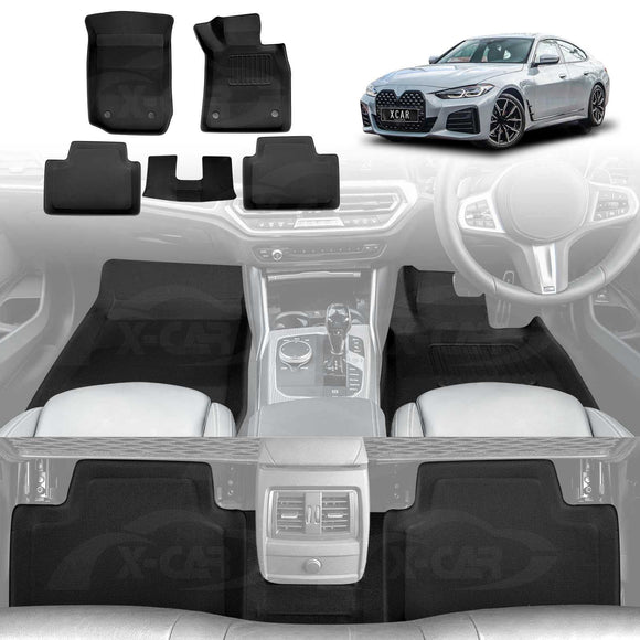 X-CAR BMW 4 Series (G26) floor mat set featuring four black carpet mats and a center rear mat, displayed with a silver BMW 4 Series Gran Coupe. The image also shows the X-CAR floor mats installed in the front and rear footwells of the vehicle interior.