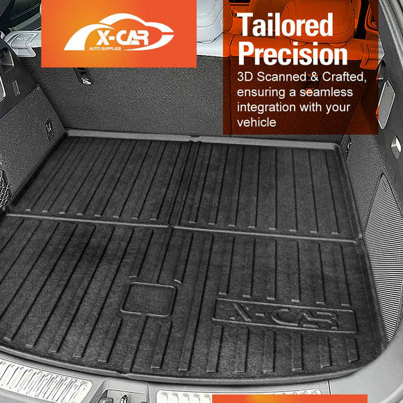 Car trunk with a black X-CAR floor mat and X-Car branding.