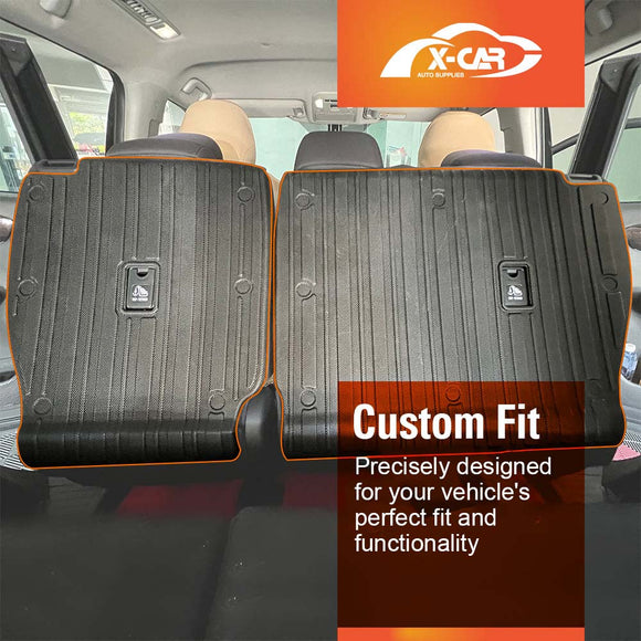 Car interior rear seats with black X-CAR custom-fit seat back cover mats installed, featuring X-CAR logo at the top and promotional text highlighting precise design for perfect fit and functionality.