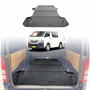 A black rubber cargo mat for a Toyota HiAce van, displayed in the cargo area of the van.