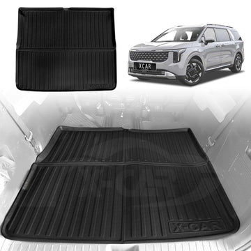 A black cargo mat for a Kia Carnival is displayed with a 3D design, indicating it is tailored for the vehicle's interior. The mat appears to be made of high-quality TPE material and is designed to fit third row seats either folded or upright.