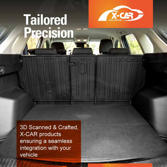 Car trunk interior with black X-CAR rear seat back cover mats installed, featuring “Tailored Precision” text and X-CAR logo at the top, and promotional text about 3D scanned and crafted design in the lower corner.