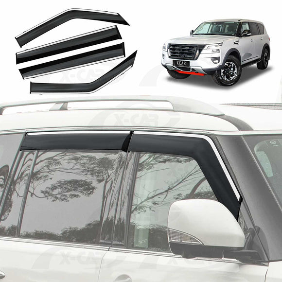 X-CAR weathershields for Nissan Patrol Y62 series installed on the windows of a vehicle. 