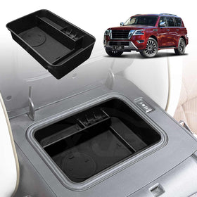 X-CAR armrest organiser tray for the Nissan Patrol Y62 installed in the centre console of the vehicle.