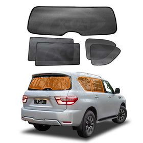 X-CAR custom-fit window sun shades for the rear windows and windscreen of a Nissan Patrol Y62 Series SUV.
