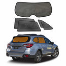 X-CAR window sunshade set for rear windows and rear windscreen windows of Subaru Outback 2015-2020 installed on the Outback's windows.