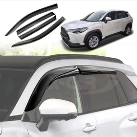 Set of dark tinted weather shields for Toyota Corolla Cross, displayed on a white background and installed on a vehicle.