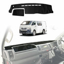 A black dash mat designed for a Toyota Hiace LWB Van, shown both as a standalone item and placed in the interior of a white Toyota Hiace LWB Van.