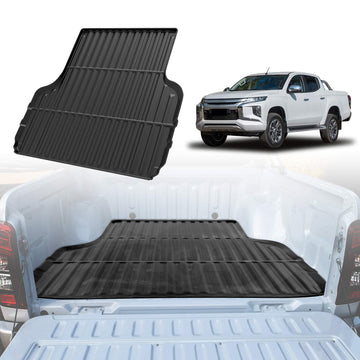 X-CAR tub liner designed for a Mitsubishi Triton MQ MR Double Cab, installed in the cargo area of the truck.