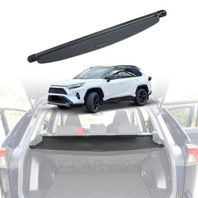 Retractable black cargo cover shown extended, with a white Toyota RAV4 SUV and the cargo cover installed across the rear trunk area.
