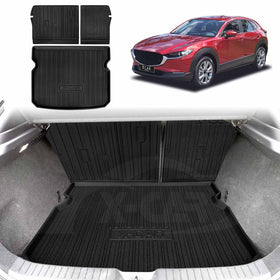 A black boot liner and back seat protector for a Mazda CX-30, displayed in a car trunk.