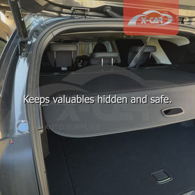 X-CAR retractable cargo cover for Subaru Outback 2020-2025 installed in the cargo area of the vehicle.