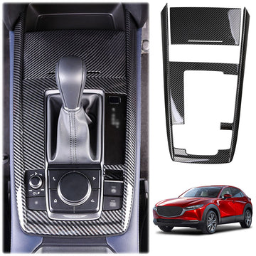 Carbon fibre print gear box shifter frame for Mazda CX-30, displayed in an ISO 9001 facility, with an image of the product installed on a vehicle for context.