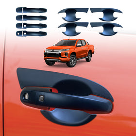X-CAR door handle covers and bowl inserts for Mitsubishi Triton 2015-2024, installed on a Triton.