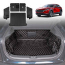 A set of black PU leather boot liner mats with khaki stitching designed for a Mazda CX-30, displayed in the context of a car trunk.