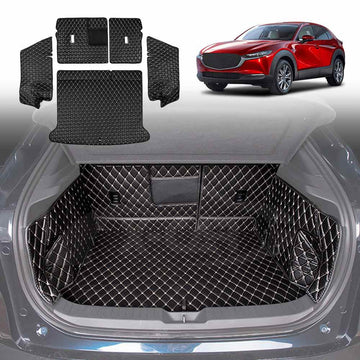 A set of black PU leather boot liner mats with khaki stitching designed for a Mazda CX-30, displayed in the context of a car trunk.