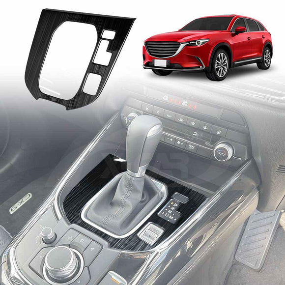 A black gear box shifter frame for a Mazda CX-9, displayed in the context of a car interior.