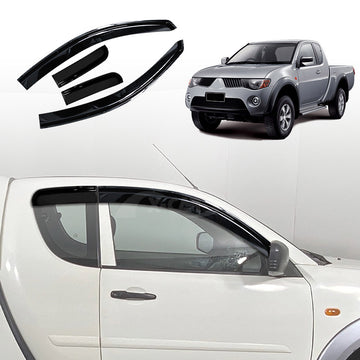 X-CAR weathershields for Mitsubishi Triton ML MN Club Cab 2006-2015 installed on the side windows of a Mitsubishi Triton pickup truck.