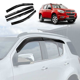 Set of four black car weather shields for window deflection, displayed on a white background and installed on a red Holden Colorado 7 SUV.